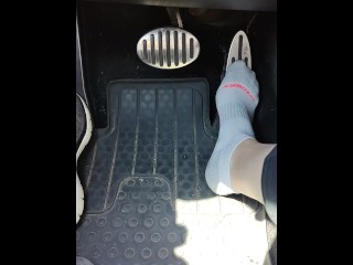 Revving my mini Cooper in my white ankle socks