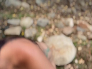 Spraying piss and deep throating cock in the creek