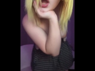 Beautiful blonde squeezes her big tits.