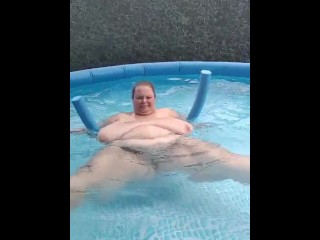 SSBBW with giant natural tits floating in the pool! by Viola Tittenfee