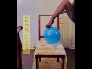 Chubby student pops blue balloons. Sit and pop! 🎈💥