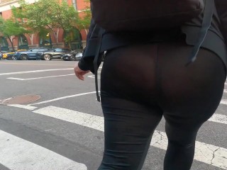 See through leggings with pink thong walking around city