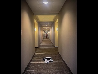 Naked walk down hotel hallway