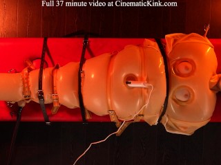 Isabel Love in inflatable latex sack