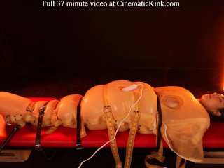 Isabel Love in inflatable latex sack