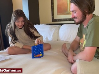 Playing a strip Connect 4 on the bed and losing all clothes in the process