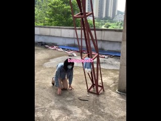 sissy wearing high heels and denim top at the construction site 1