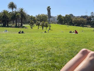Topless Sunbathing at the Park on a Busy Summer Day