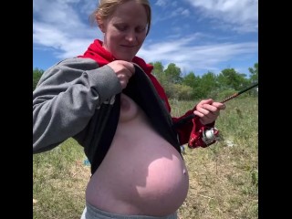 Cute pregnant milf flashes old guys fishing across from her when she sees them staring