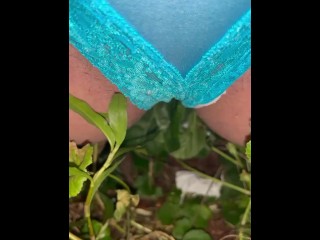 Panties pulled to side to pee in yard