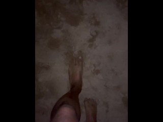 bare feet on sandy beach