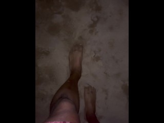 bare feet on sandy beach