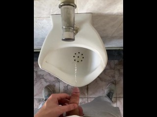 Guy pissing with big uncut cock in public toilet in slow motion POV