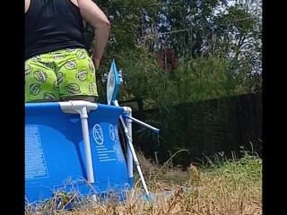 Watch P1SSQUEENSfat ass bend over doing yard work before she pisses in the backyard