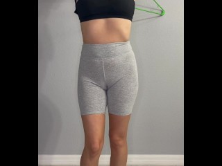 Sexy college teen stripping out of workout clothes