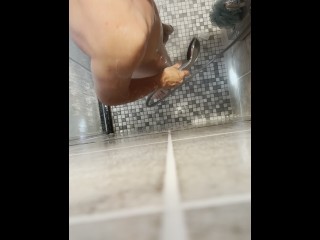 I got so horny in the shower that I started playing with my cock and moaning loudly