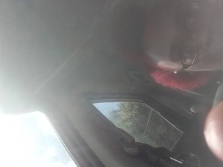 In the parking lot trying not to get caught while playing with my pussy and squirting