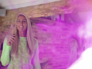 Blonde showing off transparent fishnet dress with tanlines