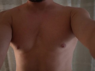 Hot stud wanking and cums on his belly