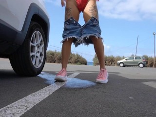 Peeing in the beach parking lot