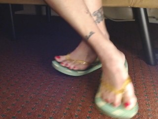 Hot Pink Painted Toenails In Flipflops Closeup