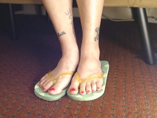 Hot Pink Painted Toenails In Flipflops Closeup