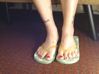 Hot Pink Painted Toenails In Flipflops Closeup