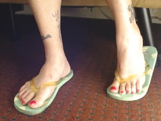Hot Pink Painted Toenails In Flipflops Closeup