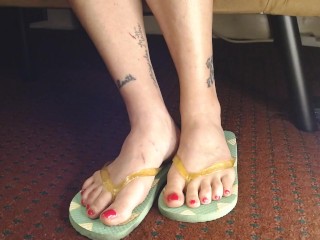 Hot Pink Painted Toenails In Flipflops Closeup
