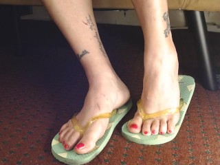 Hot Pink Painted Toenails In Flipflops Closeup