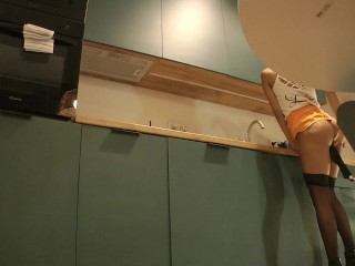 Panties Flash of a Cute Sexy Housewife on High Heels and Stockings in a Mini Short Skirt