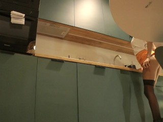 Panties Flash of a Cute Sexy Housewife on High Heels and Stockings in a Mini Short Skirt