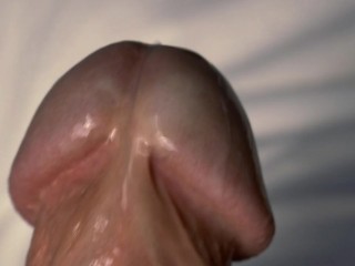 Extreme close-up of nice cock ejaculating. Slow motion. 3 days' worth of cum.