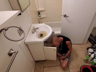 Cute Boy Deep Cleaning Bathroom