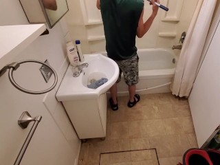 Cute Boy Deep Cleaning Bathroom