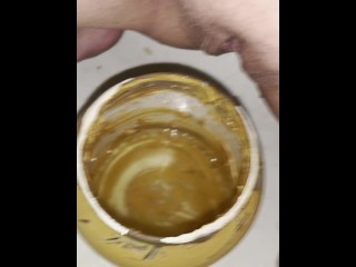 Girl pisses in 5lb jar of peanut butter