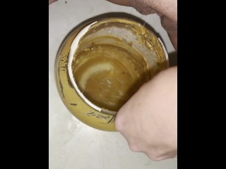 Girl pisses in 5lb jar of peanut butter