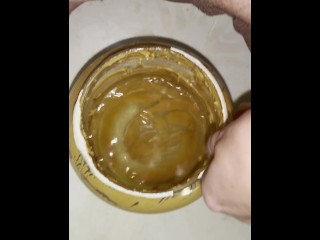 Girl pisses in 5lb jar of peanut butter