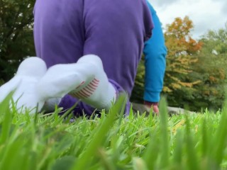 foot worship bare and in socks in public outdoor