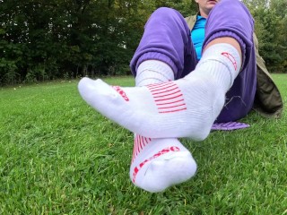 foot worship bare and in socks in public outdoor