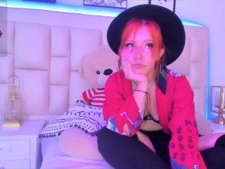 Cute redhead with a cute face shows her tits and pussy on webcam show