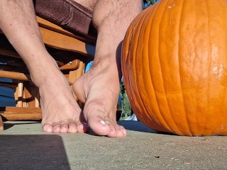 Showing off my pedicured feet next to my pumpkin