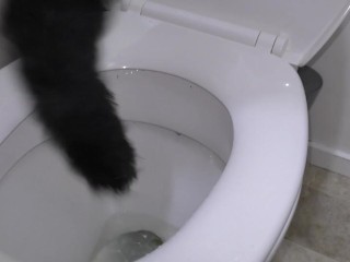 Trashy Kiwi MILF retrieves and reinserts Butt Plug tail after it falls out while pissing in toilet