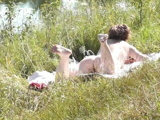 Nude Milf sunbathing on shore. Random guy watching. Naked in public. Nudist beach. Doggystyle. POV