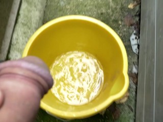 Huge outdoor piss into an orange bucket, POV. Felt so good to relieve myself al fresco.