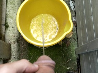 Huge outdoor piss into an orange bucket, POV. Felt so good to relieve myself al fresco.