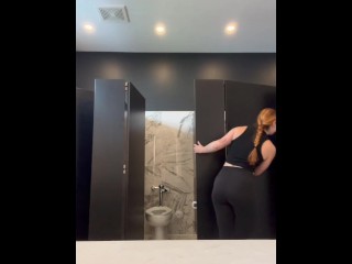 Horny Gym Slut Sneaks into Public Bathroom to Finger Herself