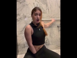 Horny Gym Slut Sneaks into Public Bathroom to Finger Herself