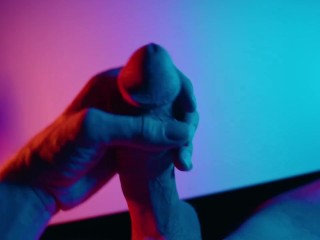 Stroking my Big White Cock under colored lighting 😈