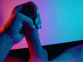 Stroking my Big White Cock under colored lighting 😈